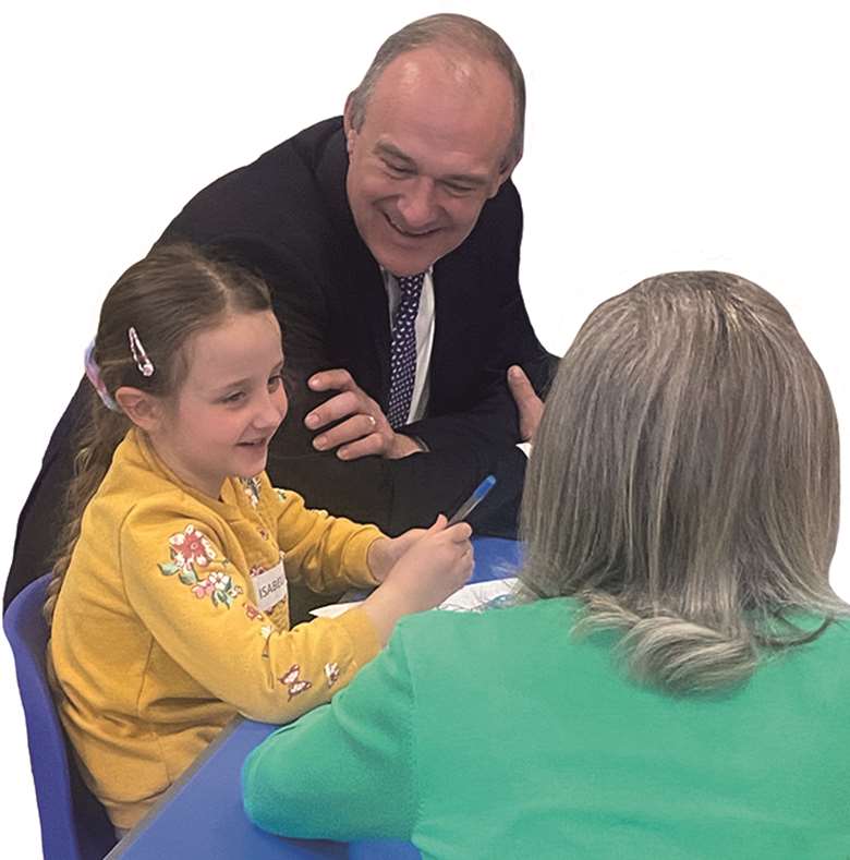 The Liberal Democrat leader, Ed Davey, with seven-year-old Isabelle on a visit to Snap in Brentwood, PHOTO: KM