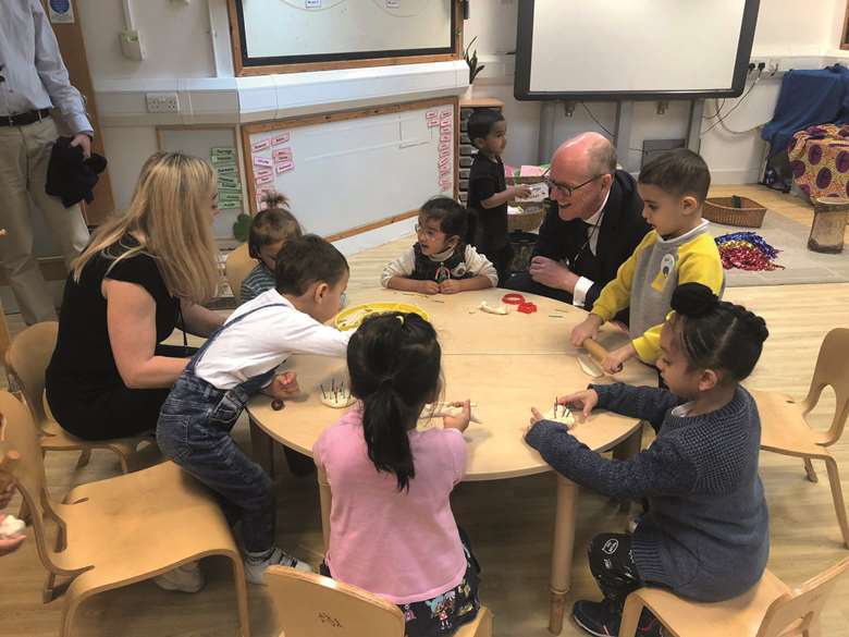 Nick Gibb (third from right) at Sheringham Nursery School in London
