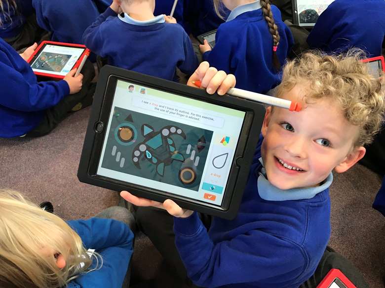 Kaligo claims to be the first digital handwriting exercise book using a stylus and tablet. It is one of six apps approved by ministers to support pre-school children's learning at home PHOTO Kaligo