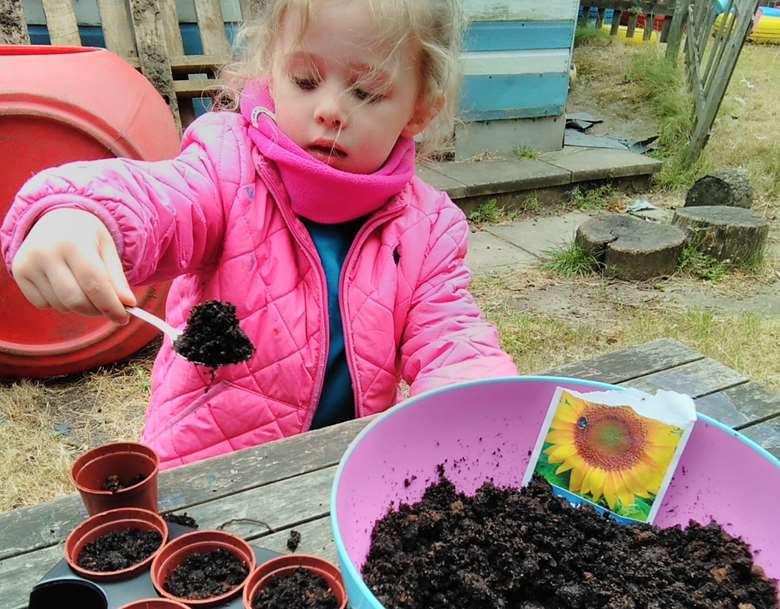 Planting sunflower seeds at Harrow Road Nursery and Pre School (LEYF) as part of LEYF's Standing Tall for Early Years campaign 