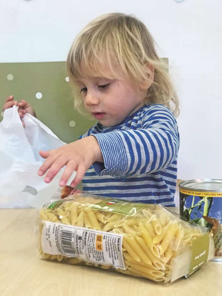Charlie distributes food parcels at First Friends