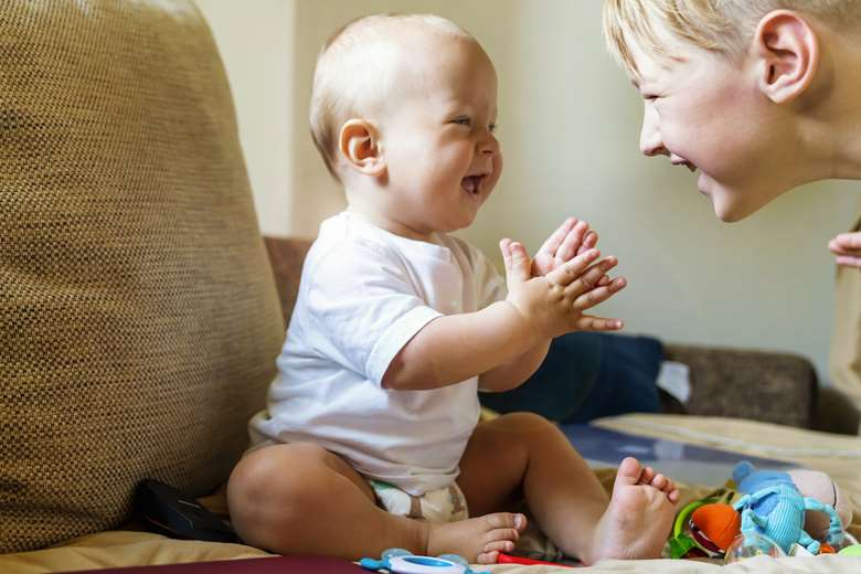 Babies can understand the subtle differences between phrases, such as 'Clap your hands',  and 'Take your hands', before they learn to talk