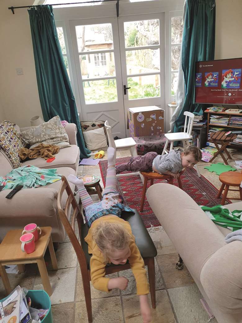 Two children recreate a normal Sunday routine disrupted in lockdown by ‘swimming’ on furniture, followed with babycinos
