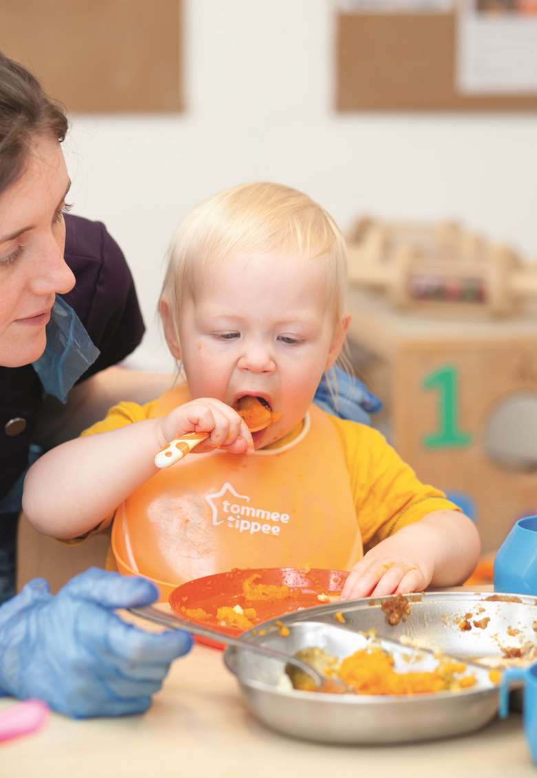 At Elmscot, practitioners sit and eat with the children, who are encouraged to try new foods