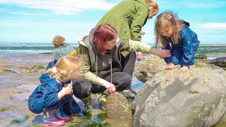 Children from Rosedene Nurseries explore Saltburn Beach on the North Yorkshire coast