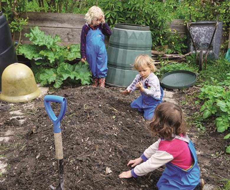 Millie’s Garden involves the children in composting and even has a compost toilet