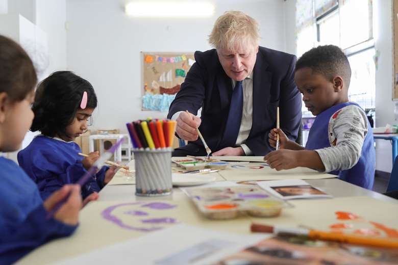 The prime minister Boris Johnson has said the Government is looking at ways to reduce the cost of childcare, PHOTO - The PM on a visit to Busy Bees in Heathrow last month