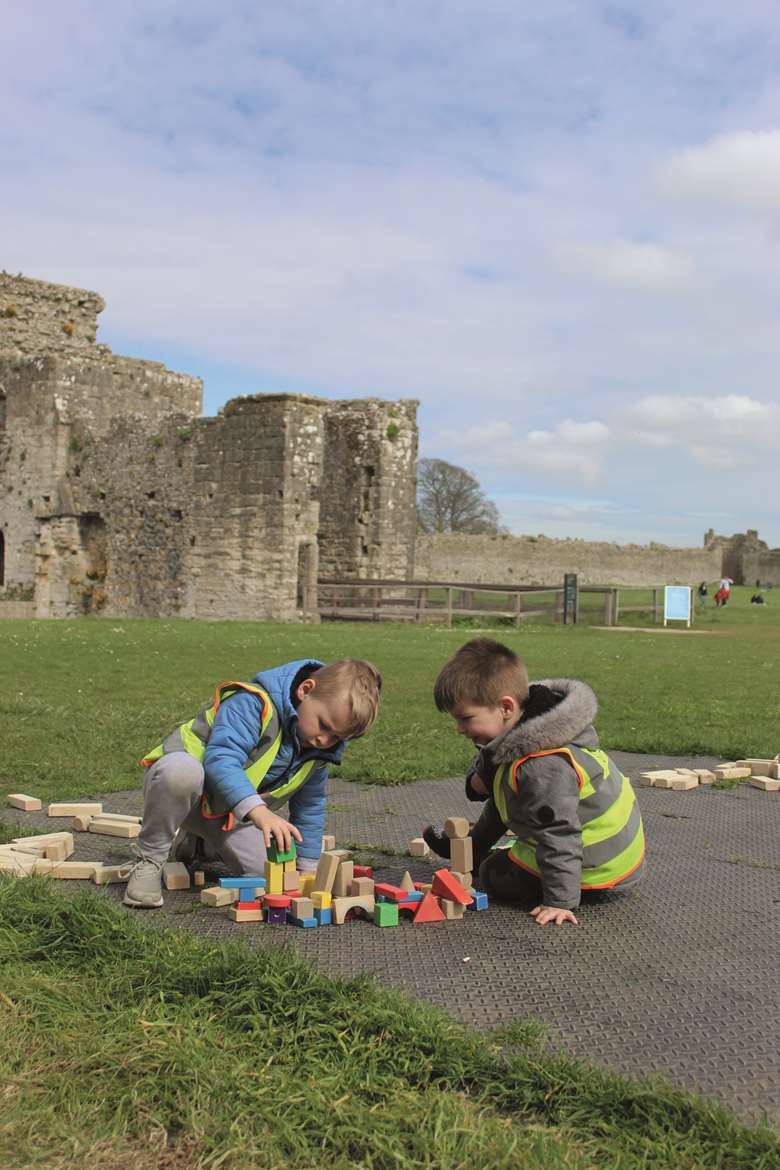 The children used blocks to build the castle while visiting it