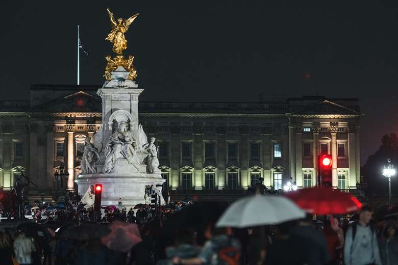 Crowds gather outside Buckingham Palace following the death of Queen Elizabeth II PHOTO Adobe Stock