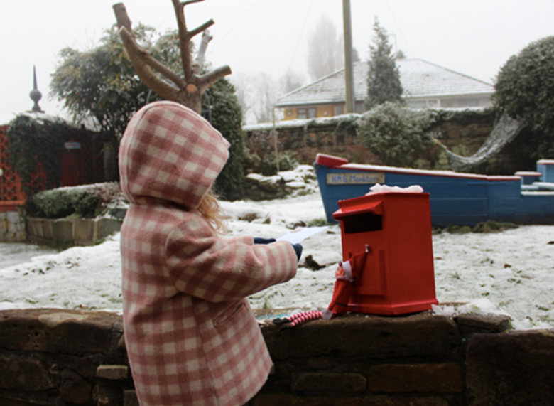 Posting letters to Father Christmas PHOTO Monkton Nursery