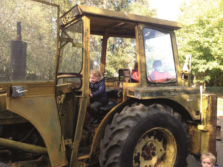Children explore the modern and vintage tractors