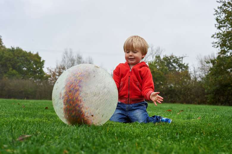 Children will have fun rolling TickiT's Constellation Ball.