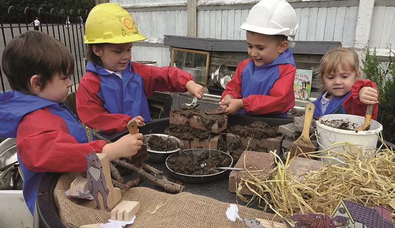 Inspired by The Three Little Pigs, children ‘cemented’ bricks together with mud