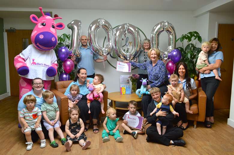 (from left): back row: Millie Giraffe, Dan Thompson, Gail Murphy, MP Mary Robinson, Stephanie Beschizza (seated) with staff and children from Elm Cottage Nursery, PHOTO: NDNA