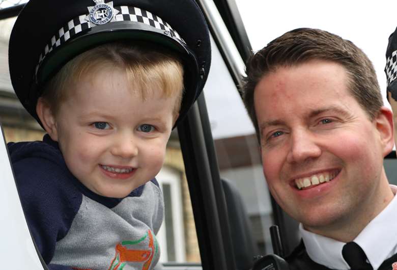 A policeman and his riot van visited children at High House Nursery, Stansted