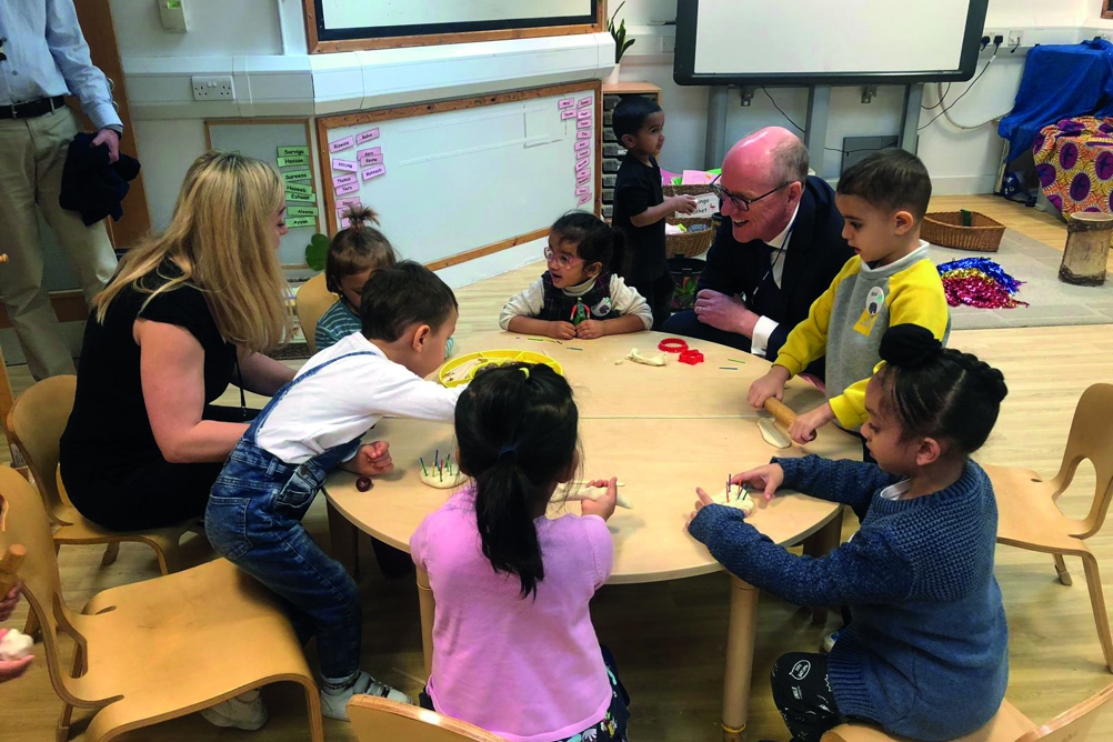 Nick Gibb (third from right) at Sheringham Nursery School in London